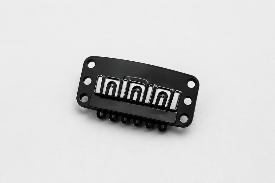 Signature Grip Extension Clip showing clip construction and finish