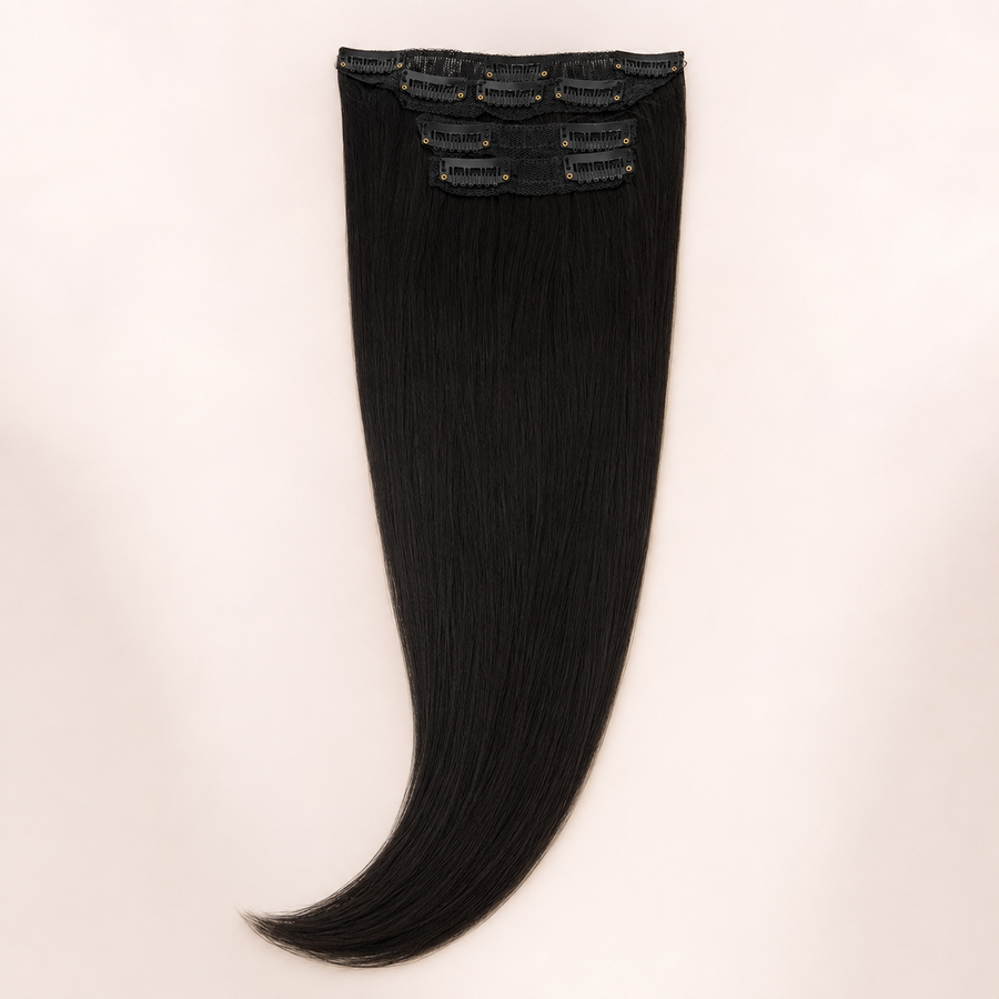 Natural-black Essential Luxe 10-Clip hair extension set with snap clips visible